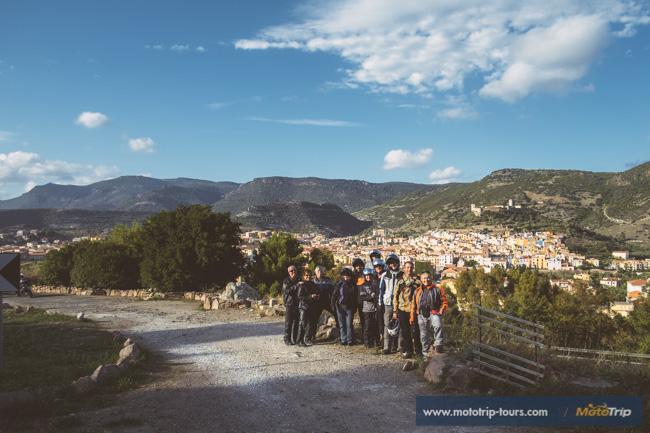 View of Bosa with motorcycle riders View of Bosa with motorcycle riders